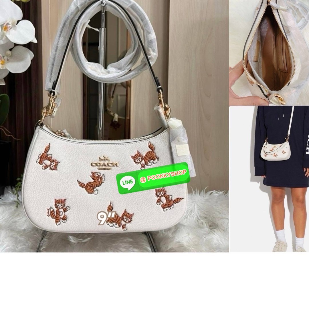 COACH TERI SHOULDER BAG WITH DANCING KITTEN PRINT🐈 Coach CC777-กระเป๋าขนาดที่น่ารักจนใจบาง 🌸✨ หนังเรียบ ชัด เพิ่มความหวานแบบมีพลัง ใช้งานง่าย หิ้วก็ได้ สะพายก็สวย สลับสายได้ 2 แบบในใบเดียว น้ำหนักเบา ฟังก์ชันครบ ถือออกงานหรือใส่ไปเด