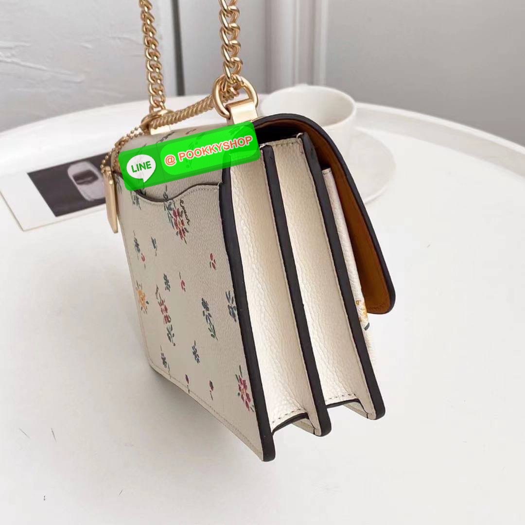 KLARE CROSSBODY WITH Flowers EMBROIDERY IM/CHALK MULTI Smooth leather| Inside zip and multifunction pockets| Snap closure, fabric lining| Outside slip pocket| Strap with 22" drop doubles up for three ways to wear: short or long on the shoulder or cro