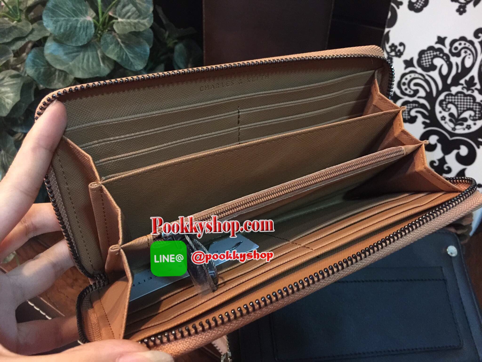 NEW! CHARLES & KEITH STUDDED FRONT POCKET WALLET กระเป๋าสตางค์ใบยาวซิปรอบรุ่นใหม่ล่าสุดแบบชนช็อปวัสดุหนังเรียบอยู่ทรงสวย เปิดปิดด้วยซิปรอบด้านหน้าแต่งหมุด พร้อมปั้มโลโก้ด้านหน้าดูสวยหรูมีสไตล์ ภายในมีช่องซิปและช่องใส่บัตรหลายช่องใส่ iphone7+ ธนบัตร บัตรได