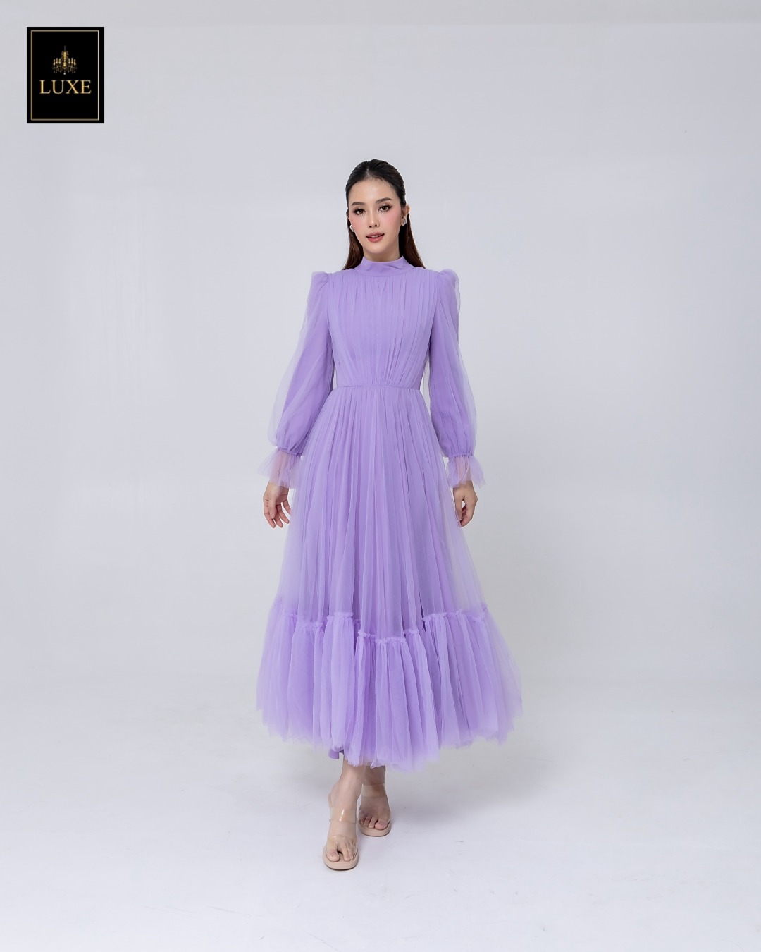 เดรสแฟชั่น แม็กซี่เดรสเสื้อคอปีนแขนยาว กระโปรงบานต่อชายรูดระบายรอบตัว มีโบว์ผูกเอว