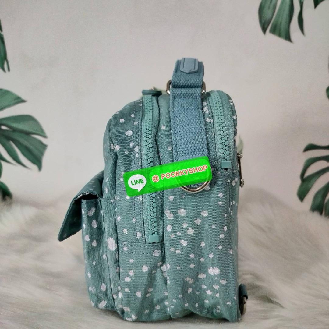 KIPLING Cand 2 ways backpack กระเป๋าถือหรือสะพายข้าง ขนาดกลาง วัสดุ Polyester 100% -ด้านหน้ามี 2 ช่องซิป -ช่องหลักโล่งกว้าง ใส่ของได้เยอะสุดๆ พร้อมช่องซิปและช่องแยกด้านข้างให้แยกของได้เป็นระเบียบมากขึ้น สามารถติใส่กระเป๋าสตางค์ใบยาวได้ มาพร้อมสายคล้องพวงก