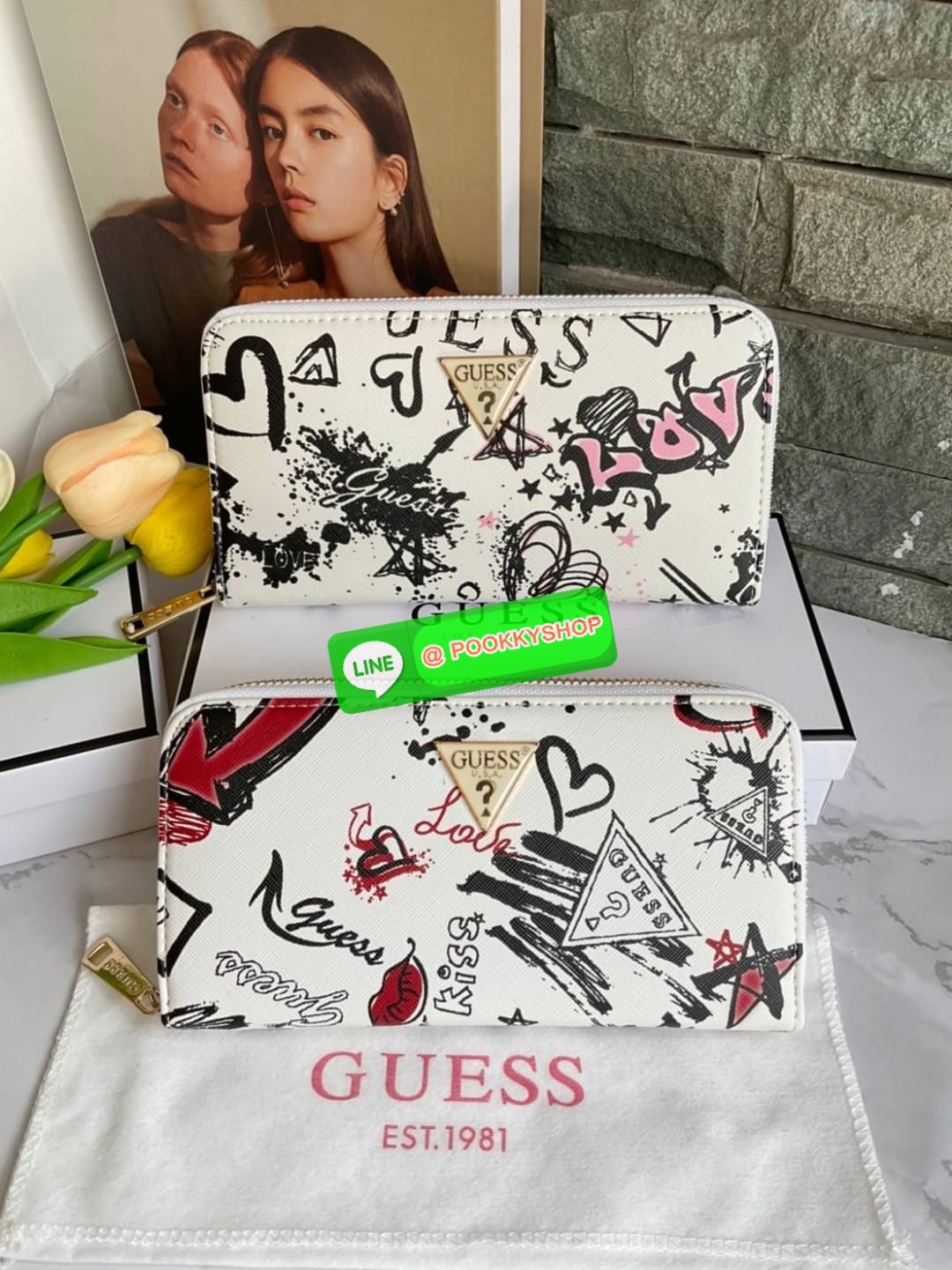 GUESS ABREE PRINTED ZIP-AROUND WALLET กระเป๋าสตางค์ใบยาวหนังซาเฟียโน่พิมพ์ลายดอกสวยหรู ด้านหน้าประดับโลโก้แบรนด์ เปิดปิดด้วยซิป ภายในแบ่งเป็น 3 ช่องหลักใส่ธนบัตรได้ มีช่องซิป 1 ช่อง ช่องใส่บัตร 8 ช่อง และมีช่องด้านหลังใส่บัตรสามารถใสธนบัตรได้อีกด้วย สามาร