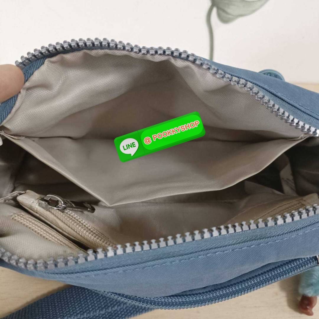 KIPLING Monkey program K16217 Seoul up sling bag รุ่น 3 ซิป สะพายข้าง ขนาดเล็กทรงสี่เหลี่ยมผืนผ้า วัสดุ Nylon 100% หลากหลายฟังก์ชั่นใช้งาน ครบครันในใบเดียว