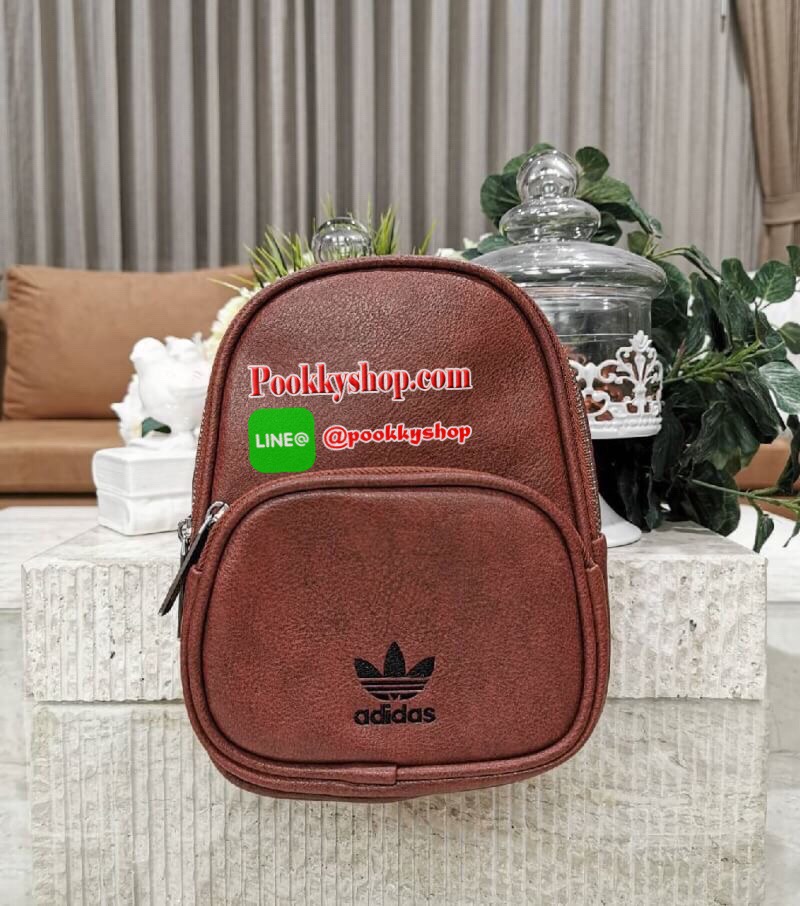 Don’t Miss! NEW ARRIVAL! ADIDAS MINI BACKPACK กระเป๋าเป้สไตล์ Sport ขนาดมินิ กำลังน่ารัก น้ำหนักเบา หนังสวยอยู่ทรงด้านหน้ามีโล้โก้และช่องซิป เปิดปิดด้วยซิปสะดวกใช้ หัวซิปแบรนด์ ภายในมีโลโก้และช่องใส่ของ มีหูจับถนัดมือ สายสะพายเลื่อนปรับระดับได้ ไอเท็มใหม่