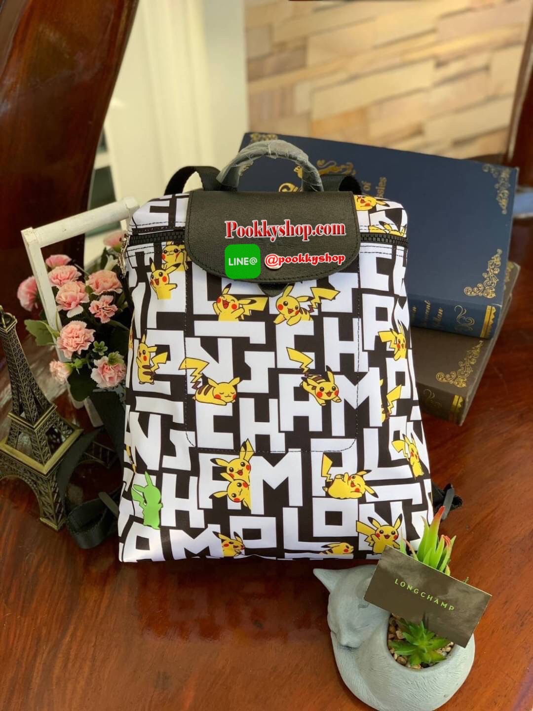 LONGCHAMP LE PLIAGE COLLECTION POKEMON BACKPACK เป้สะพายสไตล์ Le pliage ที่มี "ปิกาจู" ไปวิ่งเล่นอยู่บนกระเป๋าที่ออกมาเป็นซีรีส์ซะเลย
