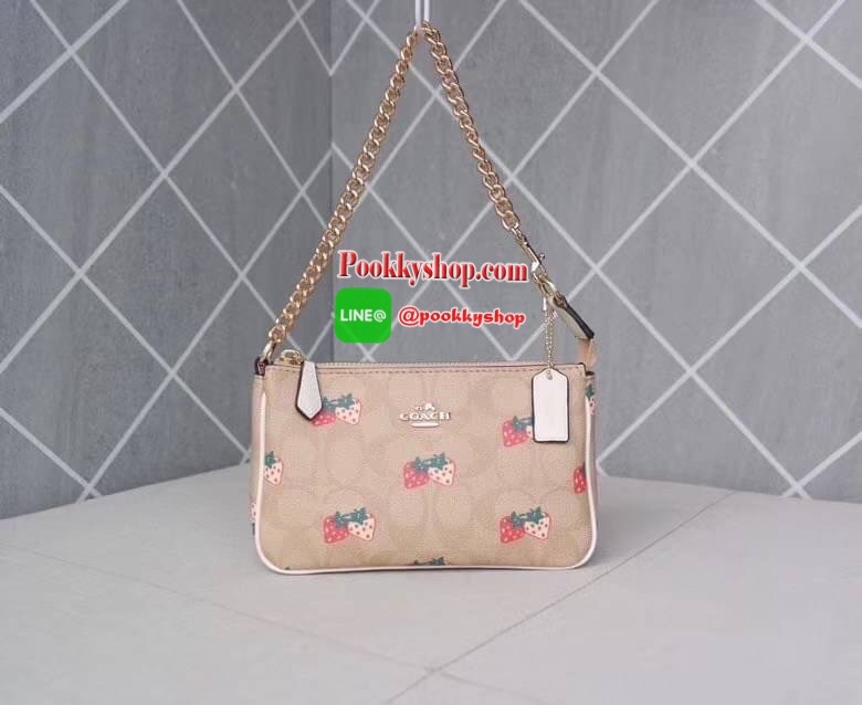 Coach POUCH IN SIGNATURE CANVAS WITH STRAWBERRY Signature coated canvas with smooth leather details Two credit card slots Inside multifunction pocket One zip closure, fabric lining| Detachable strap