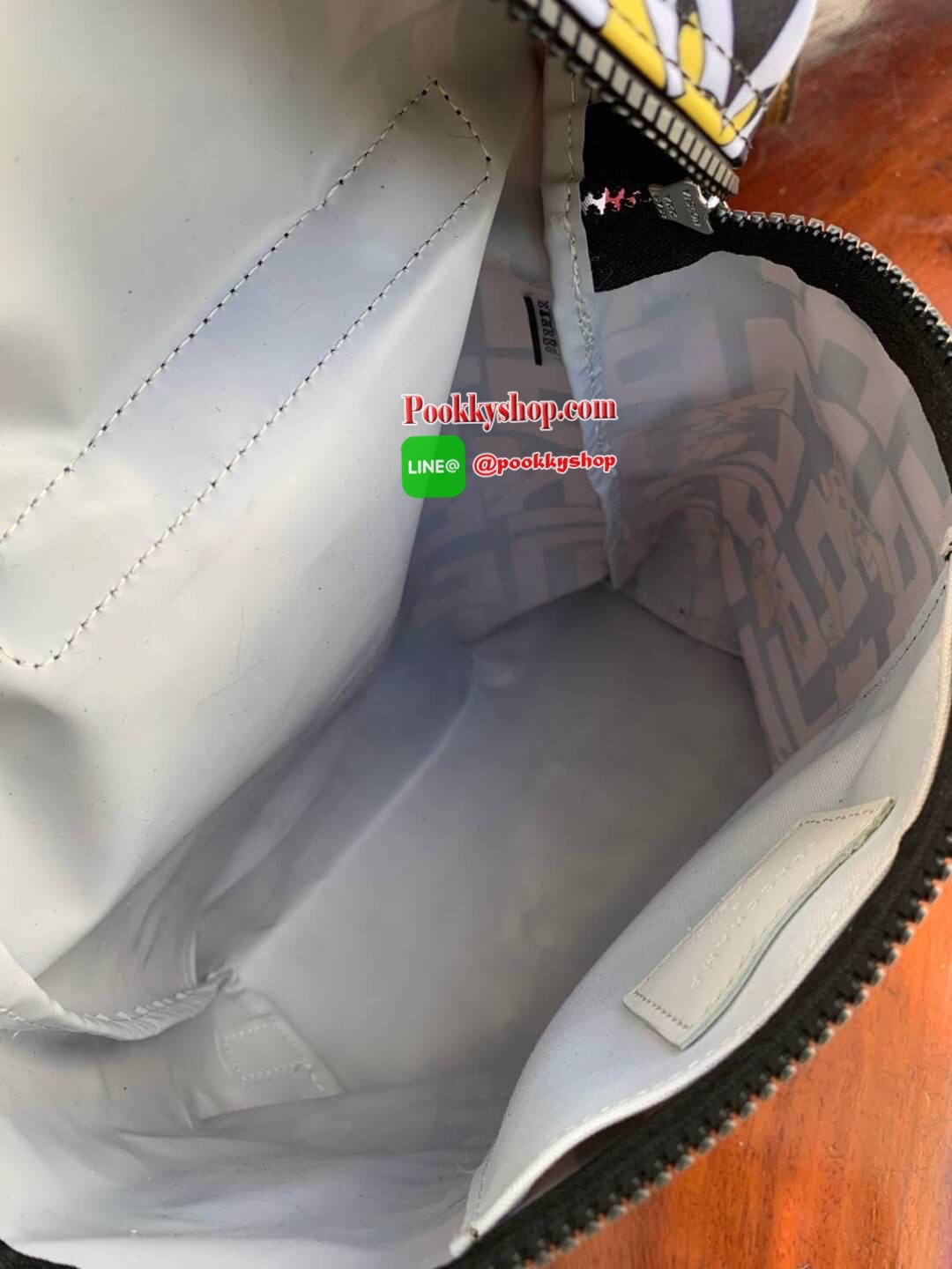 LONGCHAMP LE PLIAGE COLLECTION POKEMON BACKPACK เป้สะพายสไตล์ Le pliage ที่มี "ปิกาจู" ไปวิ่งเล่นอยู่บนกระเป๋าที่ออกมาเป็นซีรีส์ซะเลย