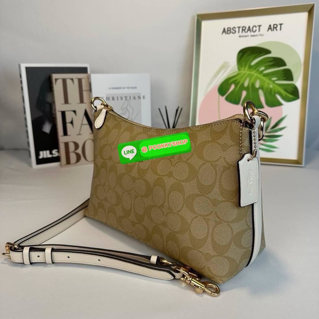 กระเป๋าสะพาย LEWIS IN SIGNATURE CANVAS ( COACH F85696) กระเป๋าหนังลาย C ผ้าใบเคลือบซิกเนเจอร์ พร้อมรายละเอียด หนัง เรียบ] ภายในกระเป๋ามัลติฟังก์ชั่น ปิดด้วยซิป ซับในผ้า