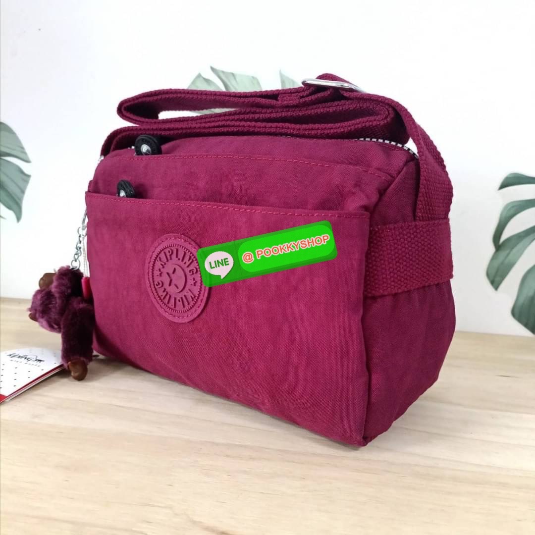 KIPLING Mini Crossbodybag กระเป๋าสะพายข้างขนาดกะทัดรัด ผลิตจากวัสดุ Nylon + ซับใน Polyester100% มีช่องใช้งานแยกย่อยมากถึง 4 ช่อง -ด้านหน้ามีช่องซิป 2 ช่อง -ช่องหลักโล่ง กว้าง จุของใช้ได้เยอะ -ด้านหลังมีช่องซิปอีก 1 ช่อง มาพร้อมพวงกุญเเจลิง สายสะพายยาวสมาร