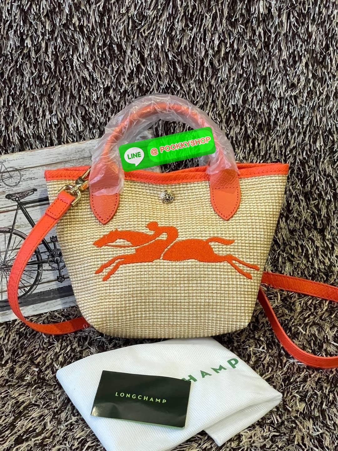 ðLONGCHAMP Le Pliage Paris - St Tropez Handtasche āļĢāļļāđāļāđāļŦāļĄāđāļāļēāļāđāļāļĢāļāļāđ āđāļāđāļāļāļĢāļ°āđāļāđāļēāļāļ·āļāļŦāļĢāļ·āļāļŠāļ°āļāļēāļĒ āļāļēāļāļŠāļēāļ raffia āļāļēāļāļāļĢāļ°āđāļāđāļēāļāļąāļāļāđāļ§āļĒāļŦāļāļąāļāļŠāļĩāļāđāļ§āļĒāļĨāļļāļāļāđāļŠāļļāļāđāļāđāļāļāļāđāļŦāļĨāđāļē Celebrities āļāļąāļāļāļĢāļ°āđāļāđāļēāļāļīāļāļāļīāļāļŠāļļāļāļŪāļīāļāļāļēāļ Longchamp āļāļĒāđāļēāļ Le Pliage Paille (āđāļĨāļ āļāļĨāļīāļĒāļēāļ āđāļāļĨāđ) āļĄāļĩāđāļĨāđ