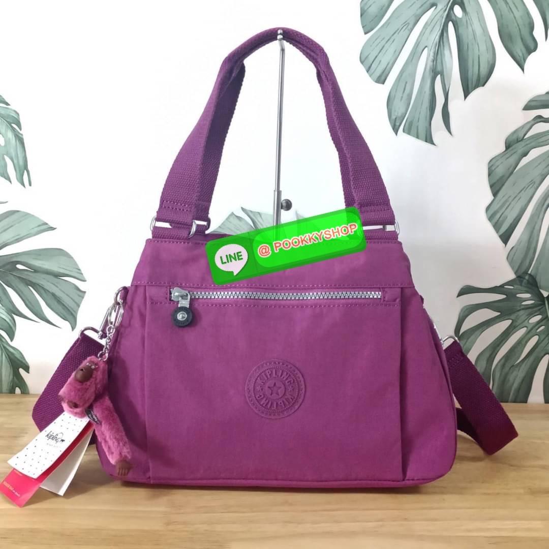 KIPLING ELISE HANDBAG กระเป๋าถือและสะพายไหล่ วัสดุ Nylon +Polyester ขนาดกำลังพอดี จุของได้มาก มีหูจับสองสาย ถือสะดวก น้ำหนักเบา มีช่องซิป ด้านหน้า ช่อง กระเป๋าหลักเปิด-ปิดด้วยซิป มี3 ช่องว่างใส่ของได้จุมากๆ ใส่มือถือได้ กระเป๋าสตางค์ใบยาว และ เครื่องสำอาง