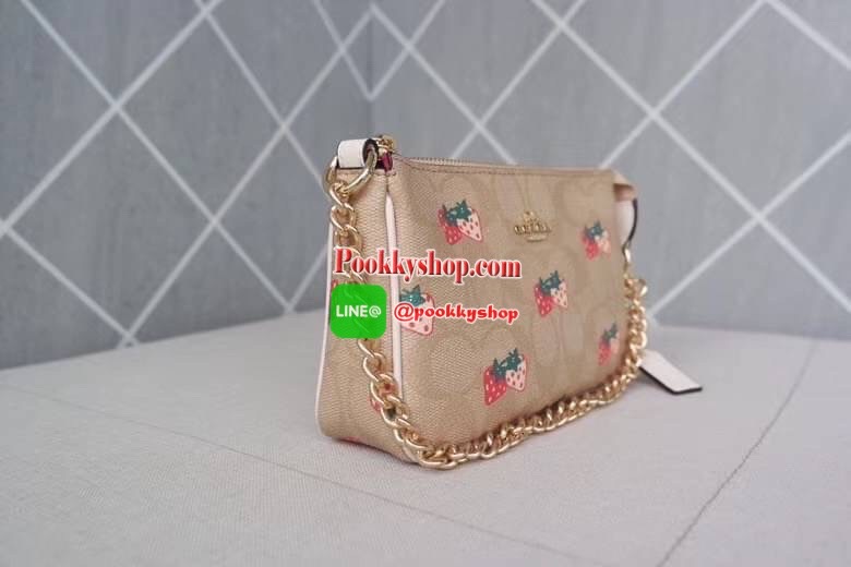 Coach POUCH IN SIGNATURE CANVAS WITH STRAWBERRY Signature coated canvas with smooth leather details Two credit card slots Inside multifunction pocket One zip closure, fabric lining| Detachable strap