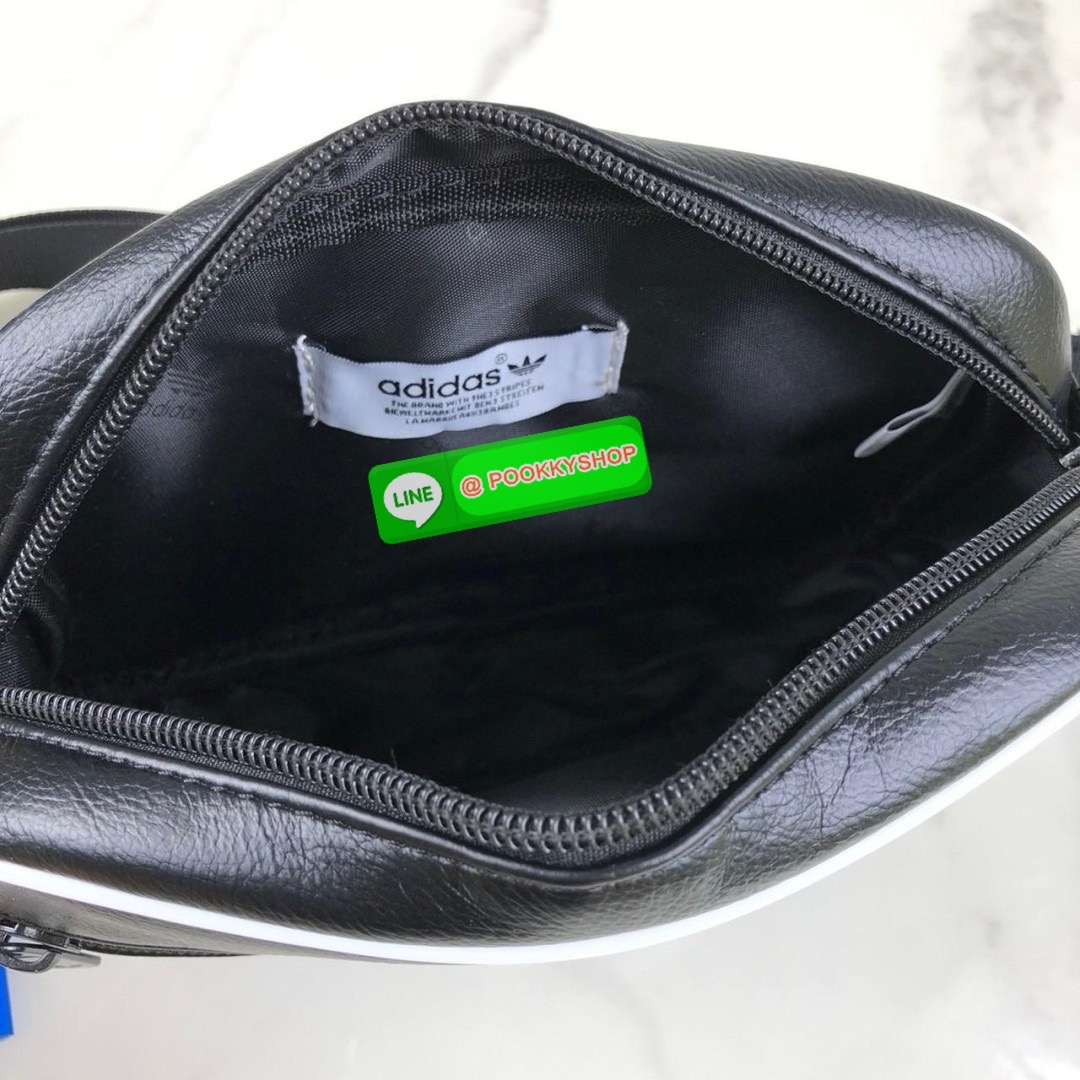 กระเป๋าสะพาย adidas ด้านหน้ามีช่องซิป 1 ช่อง ด้านบนเปิด - ปิดกระเป๋าด้วยซิป ด้านในโล่ง สายสะพาย สามารถปรับได้ Free Size ค่ะ