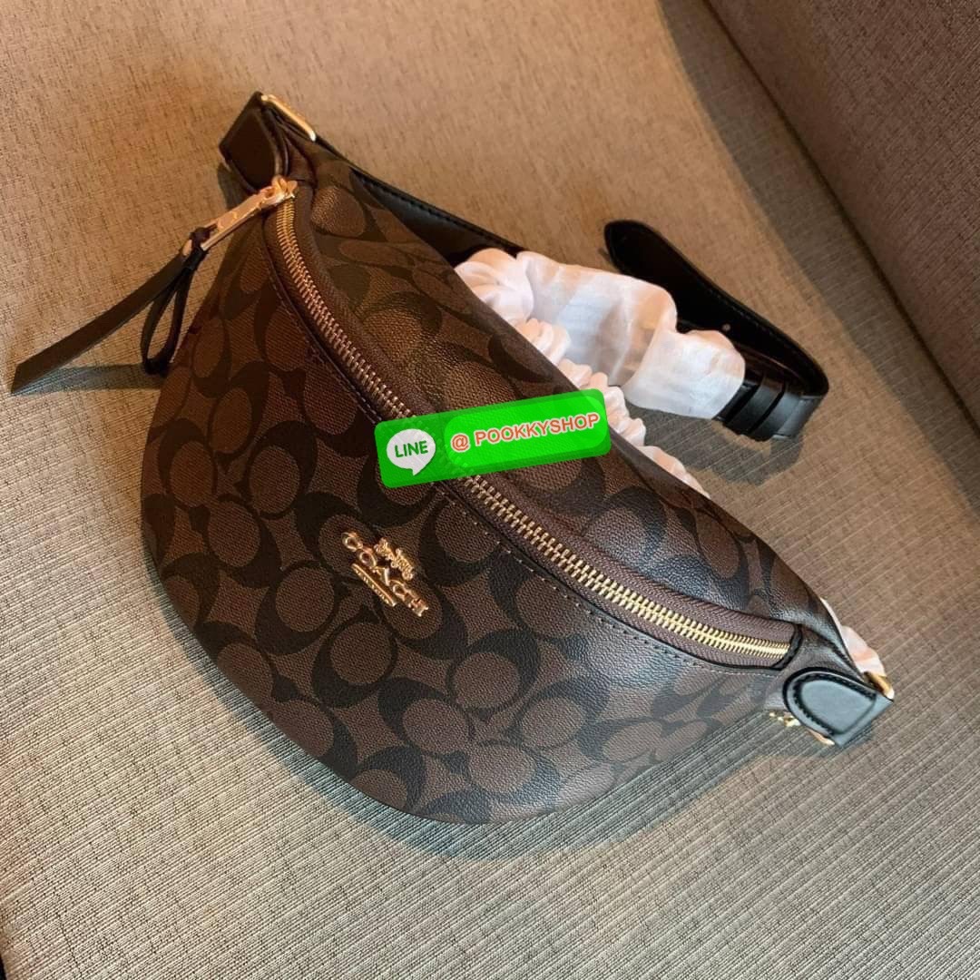 COACH F48740 BELT BAG IN SIGNATURE CANVAS กระเป๋าคาดอกทรง Unisex ทรงโดมรุ่นยอดฮิตไม่มีตกเทรน สวยเท่ทุกสี วัสดุหนังแคนวาสเคลือบคุณภาพดีตัดหนังแท้ ทนทาน ใช้งานง่าย ภายในเป็นช่องโล่ง ใส่ของได้เยอะ หยิบจับได้สะดวก ใช้ได้ทั้งชายและหญิง ใบจริงสวยไม่ผิดหวังคะ