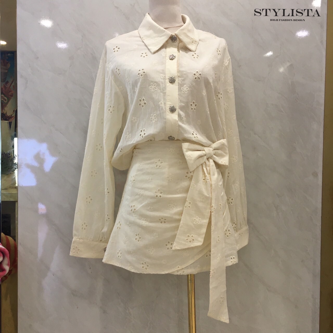 ชุดเซทแฟชั่น ชุดเซ็ต 2 ชิ้นทรงเชิ้ตแขนยาว + กระโปรงทรงไขว้ผูกโบว์สุดคิ้วท์