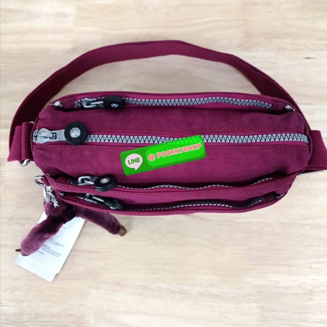 KIPLING Mini Crossbodybag กระเป๋าสะพายข้างขนาดกะทัดรัด ผลิตจากวัสดุ Nylon + ซับใน Polyester100% มีช่องใช้งานแยกย่อยมากถึง 4 ช่อง -ด้านหน้ามีช่องซิป 2 ช่อง -ช่องหลักโล่ง กว้าง จุของใช้ได้เยอะ -ด้านหลังมีช่องซิปอีก 1 ช่อง มาพร้อมพวงกุญเเจลิง สายสะพายยาวสมาร