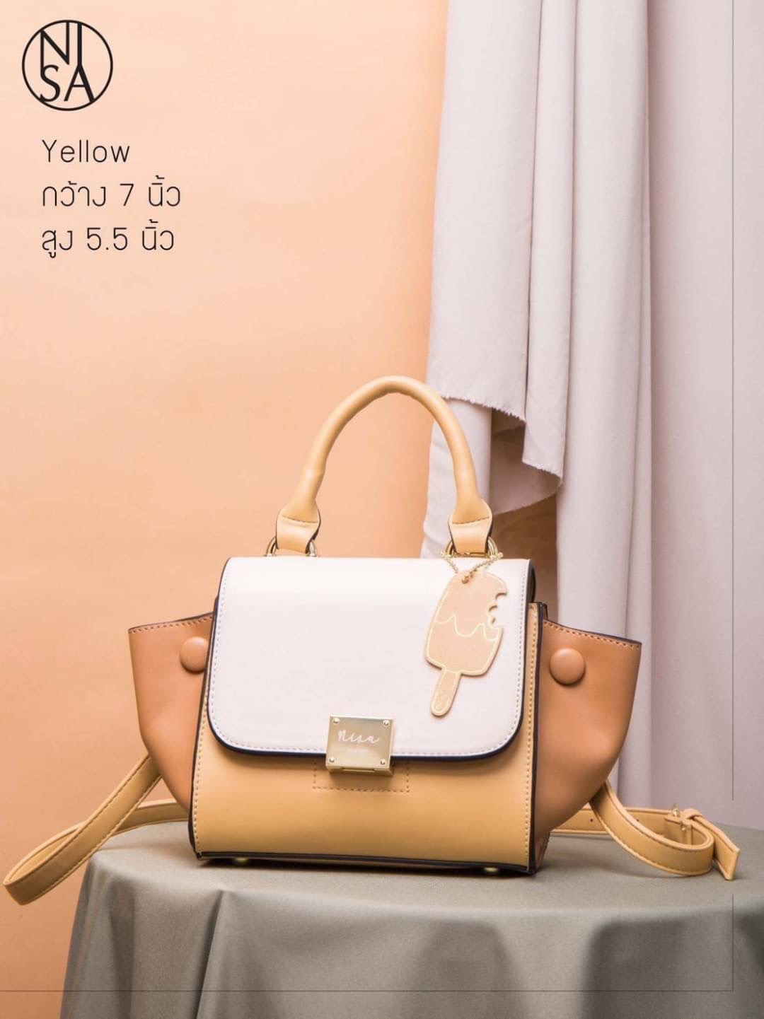 NISA Style My Authentic Brand สุดปังงง !! ~ พร้อมส่ง NISA bag งานสวยยืนหนึ่งแห่งปี ดีไซน์เก๋ ไม่ซ้ำใคร โลโก้และอะไหล่เป๊ะทุกจุด แต่งสี 3tone สดใส ขนาดกระทัดรัดน่าใช้ มาพร้อมพวงกุญแจน่ารักๆ และมีสายสะพายยาว 1 เส้น ด่วน !!! สินค้ามีจำนวนจำกัดค่ะ