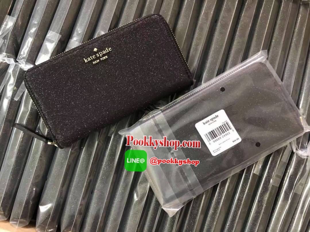 KATE SPADE JOELEY LONG WALLET กระเป๋าสตางค์ใบยาวรุ่นใหม่ล่าสุดหนัง Saffiano สไตล์ PRADA สวยน่าใช้ตัวเนื้อกระเป๋าตกแต่งด้วยกลิทเตอร์ทั้งใบ สวยหรู ภายในมีช่องซิป1ช่อง และช่องใส่บัตรหลายช่อง ใส่เหรียญ บัตรได้เยอะ ตัวจริงสวยน่าใช้มากค่ะ