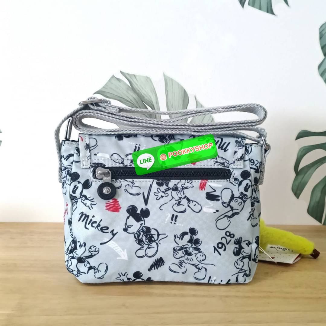 KIPLING SABIAN CROSSBODY MINI BAG กระเป๋าสะพายข้าง วัสดุ Nylon & Polyester 100% ขนาดเล็กกำลังน่ารัก เปิด-ปิดด้วยฝาปิดกระดุมแม่เหล็กและซิปแบรนด์ ด้านในทีแท็กแบรนด์