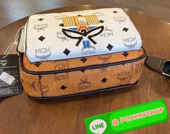 MCM Klassik Crossbody in Visetos Mix The small Klassik crossbody bag gains a color block monogram aesthetic this season.