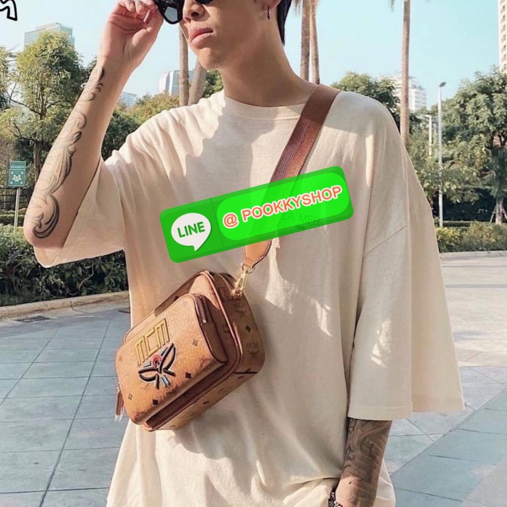 MCM Klassik Crossbody in Visetos Mix The small Klassik crossbody bag gains a color block monogram aesthetic this season.