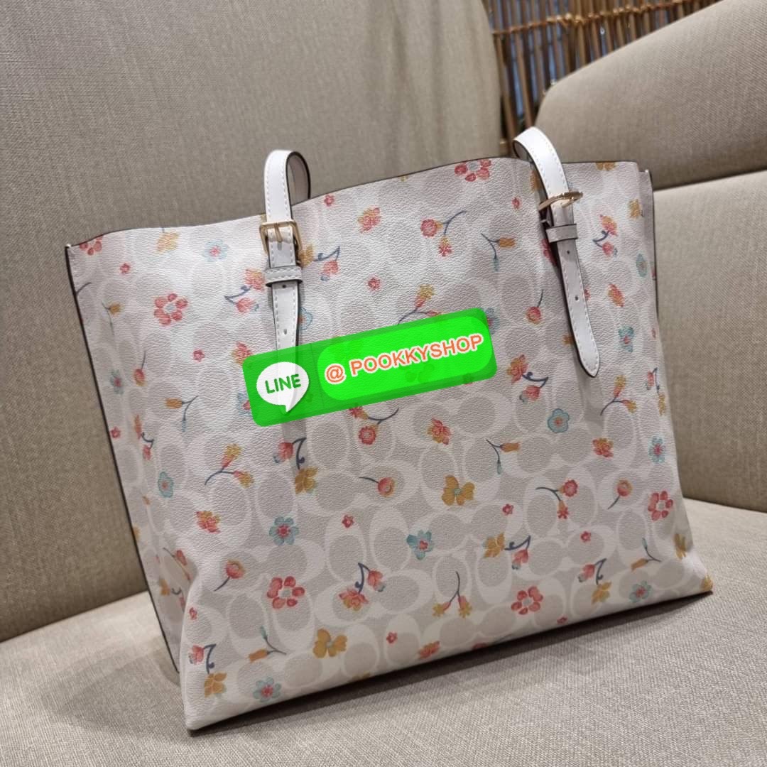 COACH C8612 MOLLIE TOTE IN SIGNATURE CANVAS WITH MYSTICAL FLORAL PRINT กระเป๋าทรงโท้ท ใบใหญ่จุใจ สวยคุ้มค่าดีไซน์ใหม่ น่าใช้ที่สุด วัสดุหนังแคนวาส หูสะพายในตัว ปรับได้อีกเล็กน้อย ภายในโล่งกว้างมาก มีช่องซิปแยกให้ ใบนี้สามารถใส่เสิ้อผ้าไปเที่ยวแบบ short va