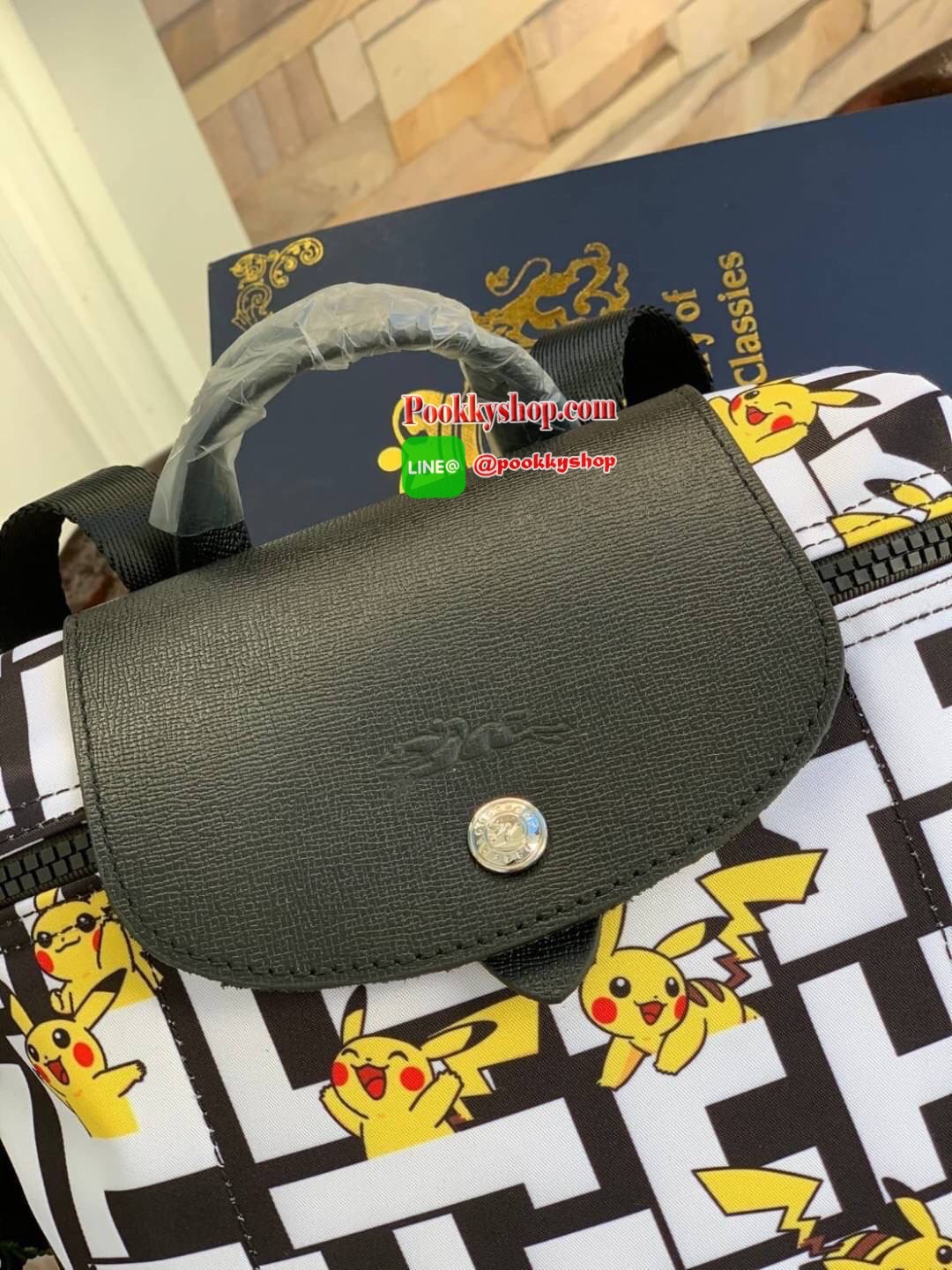LONGCHAMP LE PLIAGE COLLECTION POKEMON BACKPACK เป้สะพายสไตล์ Le pliage ที่มี "ปิกาจู" ไปวิ่งเล่นอยู่บนกระเป๋าที่ออกมาเป็นซีรีส์ซะเลย