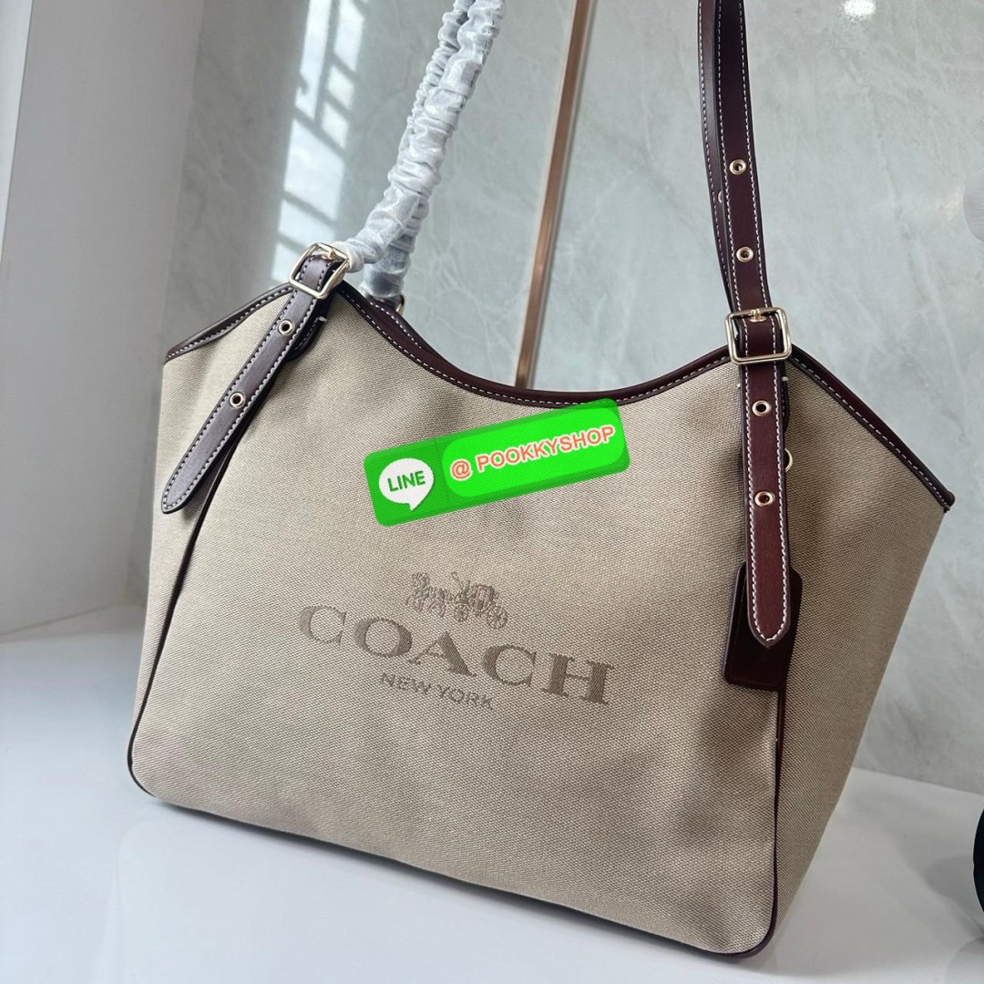 COACH CR167 MEADOW SHOULDER BAG 🔖กระเป๋าถือคอลเลคชั่นใหม่ ใบใหญ่ตอบโจทย์คนสัมภาระเยอะ 🔖วัสดุ: ผ้าแคนวาสตัดขอบหนังแท้ 🔖เปิด-ปิดด้วยซิป 🔖ภายในโล่งใส่ของได้เยอะมาก มีช่องซิป1ช่อง ช่องใส่ของจุกจิก1ช่อง 🔖ด้านหลังมีช่องซิ
