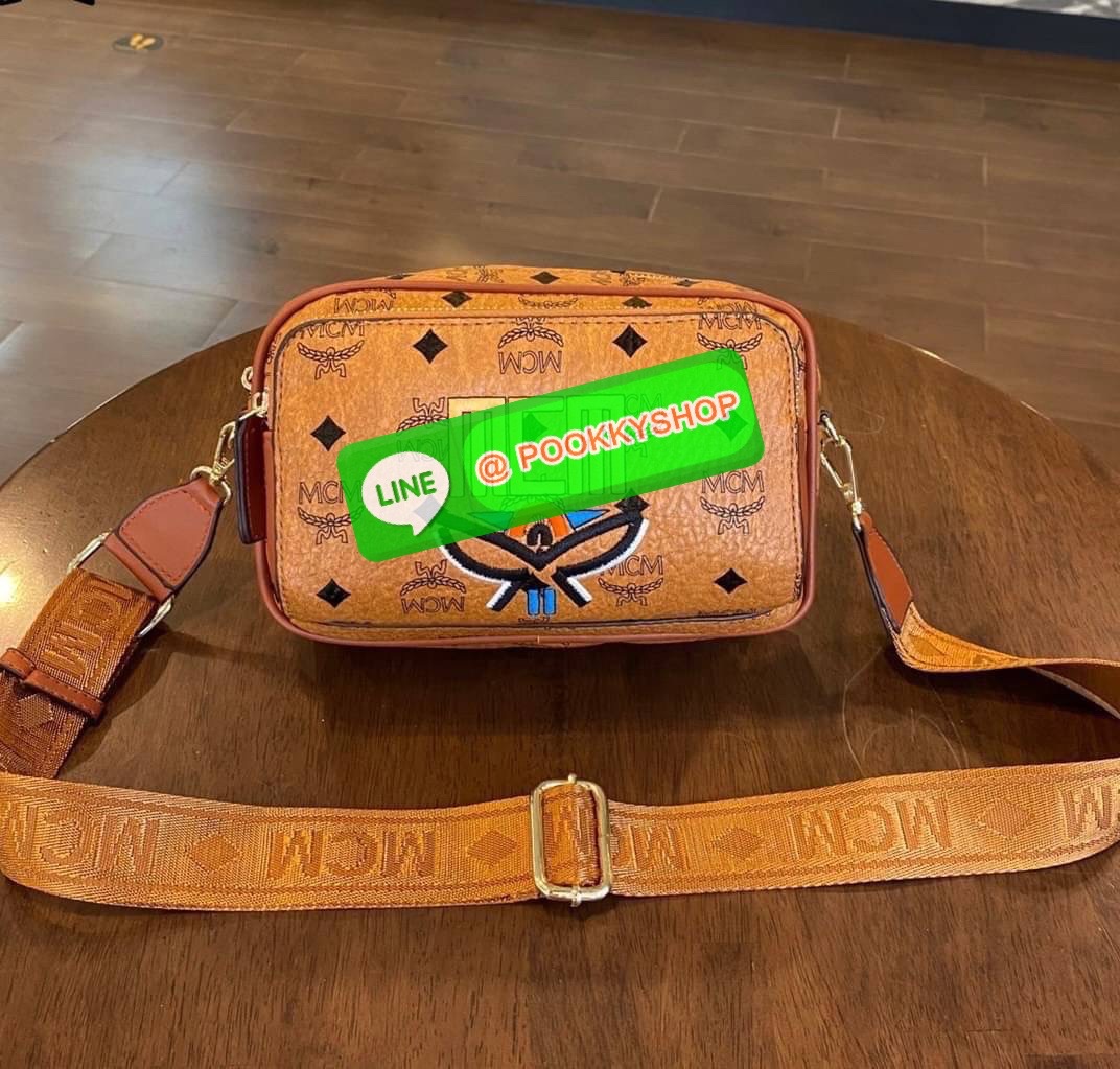 MCM Klassik Crossbody in Visetos Mix The small Klassik crossbody bag gains a color block monogram aesthetic this season.