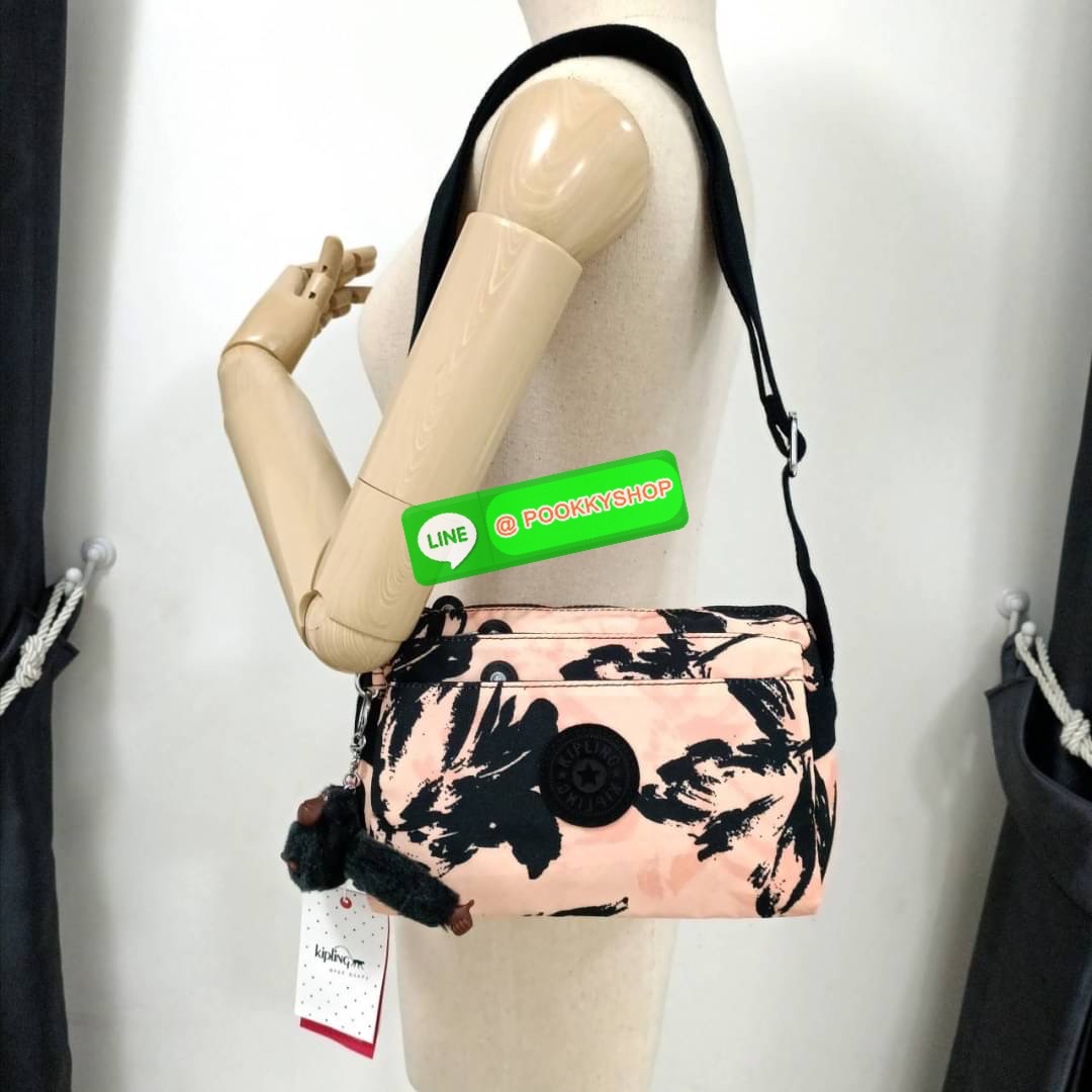 KIPLING Mini Crossbodybag กระเป๋าสะพายข้างขนาดกะทัดรัด ผลิตจากวัสดุ Nylon + ซับใน Polyester100% มีช่องใช้งานแยกย่อยมากถึง 4 ช่อง -ด้านหน้ามีช่องซิป 2 ช่อง -ช่องหลักโล่ง กว้าง จุของใช้ได้เยอะ -ด้านหลังมีช่องซิปอีก 1 ช่อง มาพร้อมพวงกุญเเจลิง สายสะพายยาวสมาร