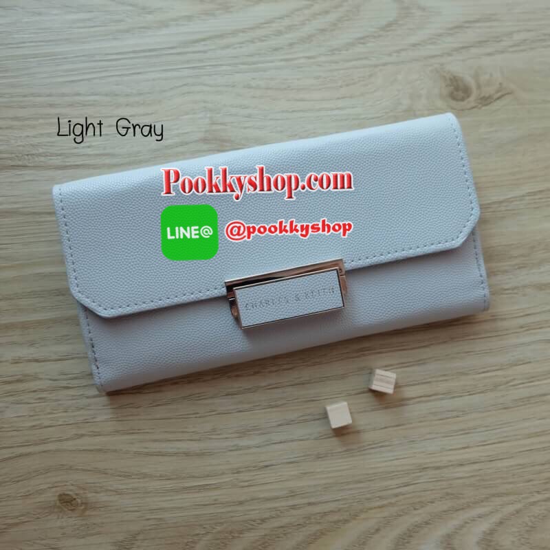 Charles & Keith Push-Lock Long Wallet พร้อมส่งทั้ง 8 สี!! กระเป๋าสตางค์ใบยาว สามารถใช้งานได้ทั้งด้านหน้าและด้านหลัง ด้านหน้าเปิด - ปิดด้วยตัวกดล็อคทั้ง 2 ฝั่งพร้อมกัน ภายในมีช่องซิปและช่องใส่ธนบัตร ด้านหลังเปิด - ปิดด้วยกระดุม ภายในมีช่องใส่บัตรหลายช่องแล