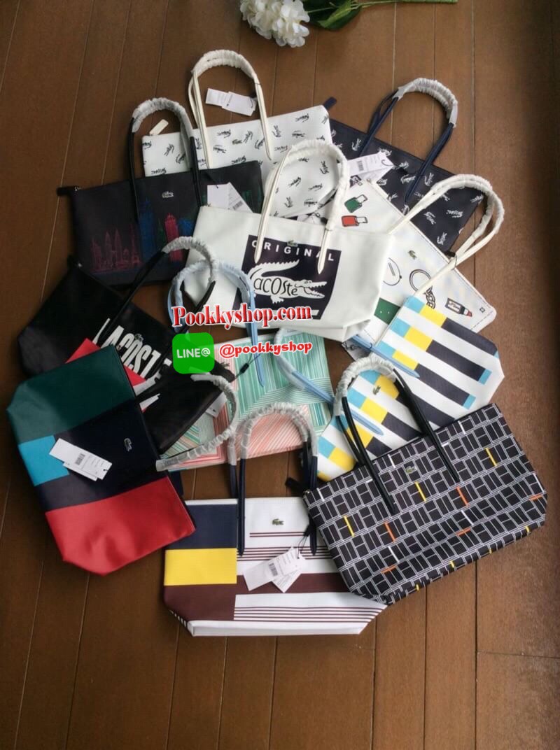 ลาคอส pu split cow leather bag รุ่นขายดีค่ะ!! กระเป๋าทรง shopping ลายกราฟฟิก ลายสดใส พร้อมส่งหลากสีรุ่นฮอตฮิตตลอดกาล แบบสวยคลาสสิค ใช้ได้ในทุกวัน ด้านหน้าประดับโลโก้จระเข้สัญลักษณ์แบรนด์ เปิดปิดกระเป๋าแบบซิป ที่จับหัวซิปปั้แบรนด์ ภายในกว้างใส่ของจุ มีช่