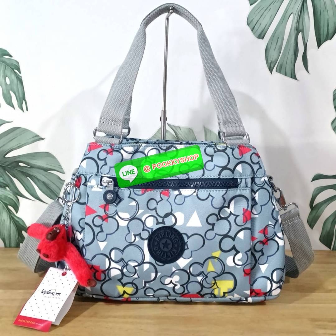 KIPLING ELISE HANDBAG กระเป๋าถือและสะพายไหล่ วัสดุ Polyester 100% ขนาดกำลังพอดี จุของได้มาก มีหูจับสองสาย ถือสะดวก น้ำหนักเบา มีช่องซิป ด้านหน้า ช่อง กระเป๋าหลักเปิด-ปิดด้วยซิป มี3 ช่องว่างใส่ของได้จุมากๆ ใส่มือถือได้ กระเป๋าสตางค์ใบยาว และ เครื่องสำอางค์