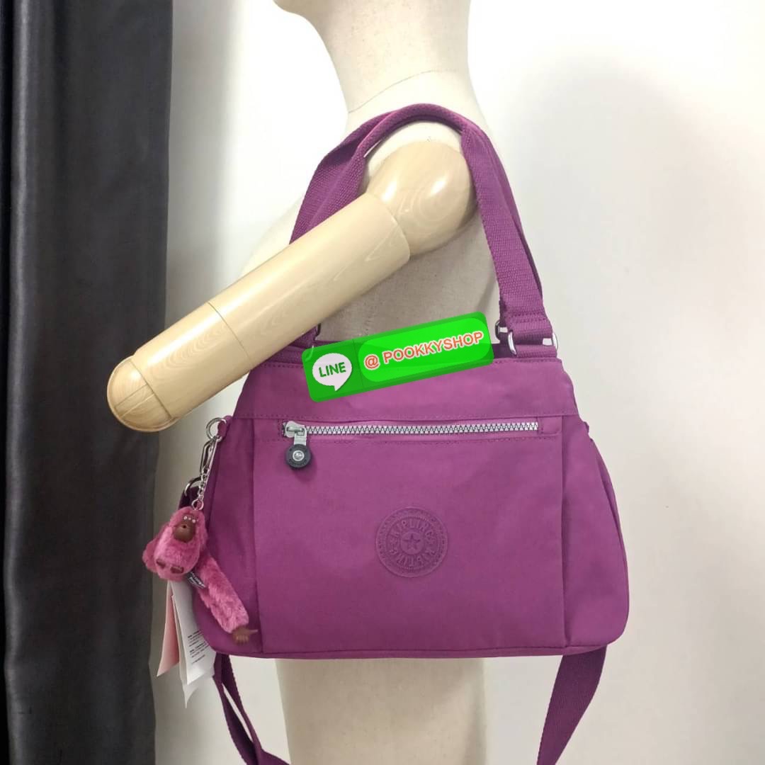 KIPLING ELISE HANDBAG กระเป๋าถือและสะพายไหล่ วัสดุ Nylon +Polyester ขนาดกำลังพอดี จุของได้มาก มีหูจับสองสาย ถือสะดวก น้ำหนักเบา มีช่องซิป ด้านหน้า ช่อง กระเป๋าหลักเปิด-ปิดด้วยซิป มี3 ช่องว่างใส่ของได้จุมากๆ ใส่มือถือได้ กระเป๋าสตางค์ใบยาว และ เครื่องสำอาง