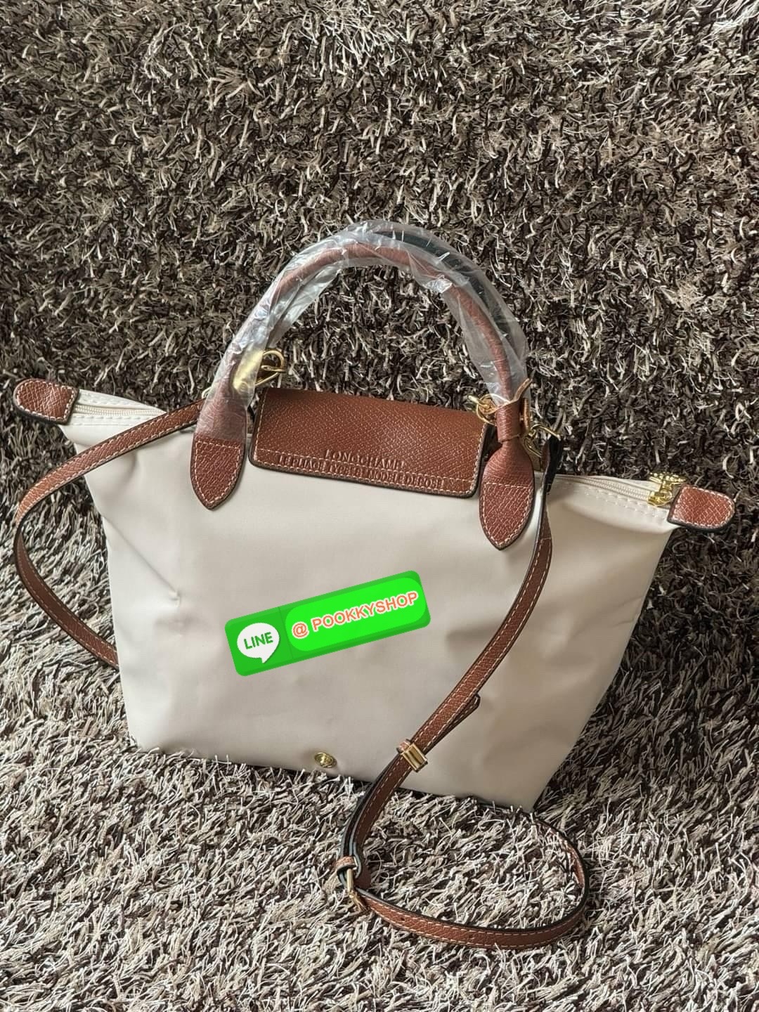 LONGCHAMP LE PLIAGE ORIGINAL S HANDBAG Crossbody Bag กระเป๋าสะพายไหล่ รุ่น Original มีเอกลักษณ์อันโดดเด่นของรุ่นไอคอนนิคของ Longchamp อย่าง Le Pliage (เลอ ปลิยาจ) โดย Longchamp ได้รับแรงบันดาลใจจากศิลปะการพับกระดาษแบบ Origami (โอริกามิ) ในการสรรค์สร้างกระ