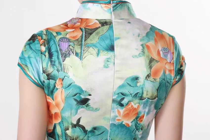 ชุดกี่เพ้า ชุด กี่เพ้าประยุกต์ เนื้อผ้าไหม ลายดอก สีโทนเขียว แต่งปลายขลิบ เนื้อผ้าสวยหรู งานเนี๊ยบมากคะ Size M