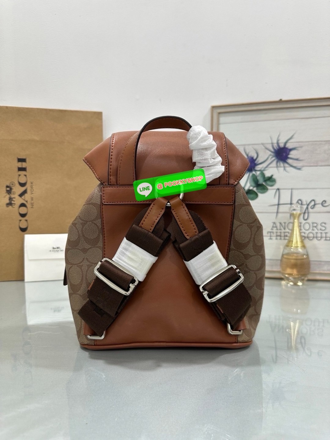 COACH PACE BACKPACK COACH CR100 | Refined calf leather | Inside zip and multifunction pockets | Drawstring and speedclip closures, fabric lining | Handle with 3" drop | Outside zip pocket | Outside zip access to interior |