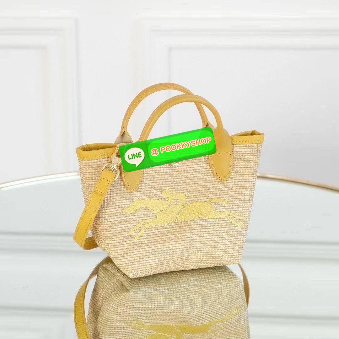 ðLONGCHAMP Le Pliage Paris - St Tropez Handtasche āļĢāļļāđāļāđāļŦāļĄāđāļāļēāļāđāļāļĢāļāļāđ āđāļāđāļāļāļĢāļ°āđāļāđāļēāļāļ·āļāļŦāļĢāļ·āļāļŠāļ°āļāļēāļĒ āļāļēāļāļŠāļēāļ raffia āļāļēāļāļāļĢāļ°āđāļāđāļēāļāļąāļāļāđāļ§āļĒāļŦāļāļąāļāļŠāļĩāļāđāļ§āļĒāļĨāļļāļāļāđāļŠāļļāļāđāļāđāļāļāļāđāļŦāļĨāđāļē Celebrities āļāļąāļāļāļĢāļ°āđāļāđāļēāļāļīāļāļāļīāļāļŠāļļāļāļŪāļīāļāļāļēāļ Longchamp āļāļĒāđāļēāļ Le Pliage Paille (āđāļĨāļ āļāļĨāļīāļĒāļēāļ āđāļāļĨāđ) āļĄāļĩāđāļĨāđ