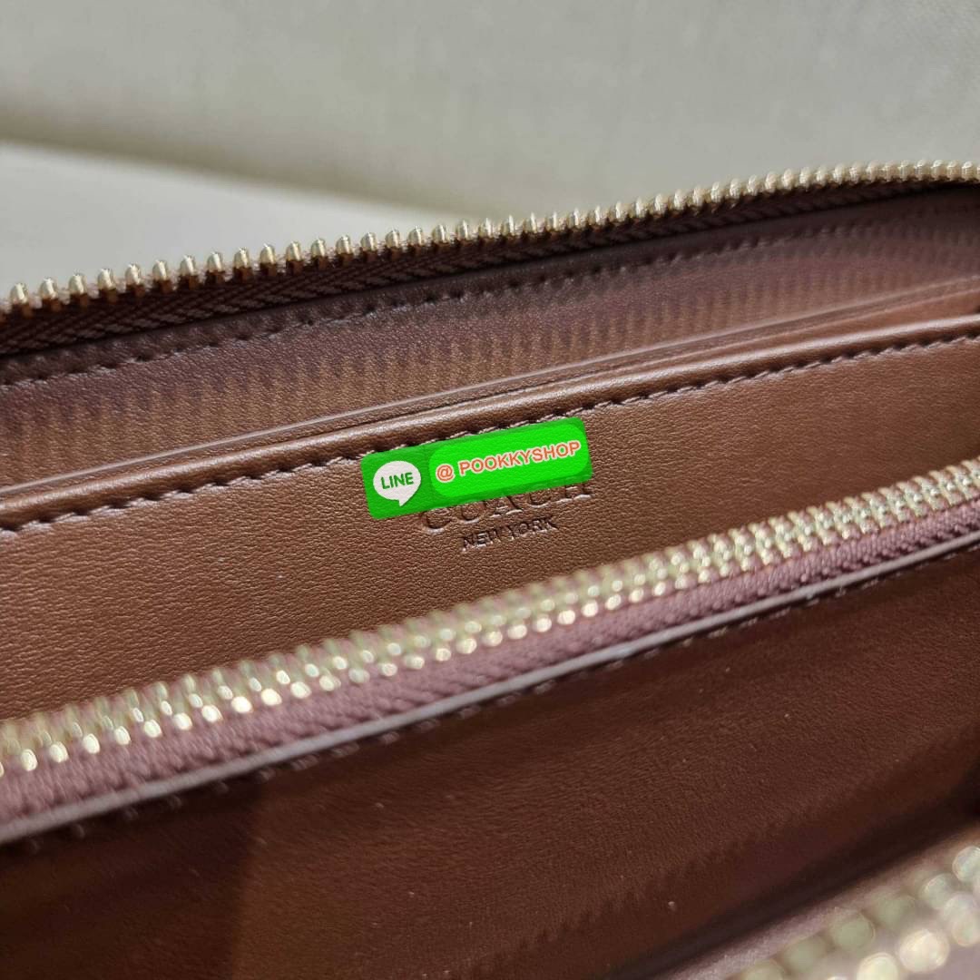 COACH C8736 LONG ZIP AROUND WALLET IN SIGNATURE CANVAS WITH WILDFLOWER PRINT น้องน่ารัก คอลใหม่ล่าสุด กระเป๋าสตางค์ใบยาวกึ่งคล้องมือ รุ่นขายดี มาในดีไซน์สุดคิ้วท์ น่าใช้!! วัสดุหนังแคนวาสเคลือบลาย มาพร้อมสายคล้องมือ ถอดออกได้ ภายในใส่บัตรได้เยอะ มีช่องซิป