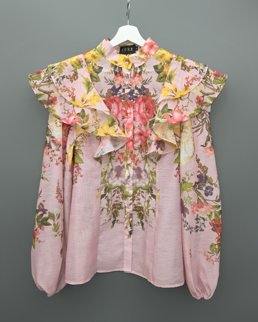 ชุดเซทแฟชั่น เซ็ตเสื้อคอกลมแขนยาว+กระโปรงยาว แต่งระบายตัวเสื้อหน้าและหลัง