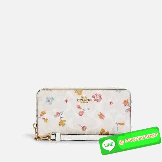 COACH C8695 LONG ZIP AROUND WALLET IN SIGNATURE CANVAS WITH MYSTICAL FLORAL PRINT พร้อมเสิร์ฟความหรู กับคอลใหม่ล่าสุด กระเป๋าสตางค์ใบยาวกึ่งคล้องมือ มาในดีไซน์ผู้ดี เรียบหรู ถือใช้แล้วขับผิวมาก ลวดลายดอกไม้คละเคล้าสวยงาม วัสดุหนังแคนวาสเคลือบลาย มาพร้อมสา