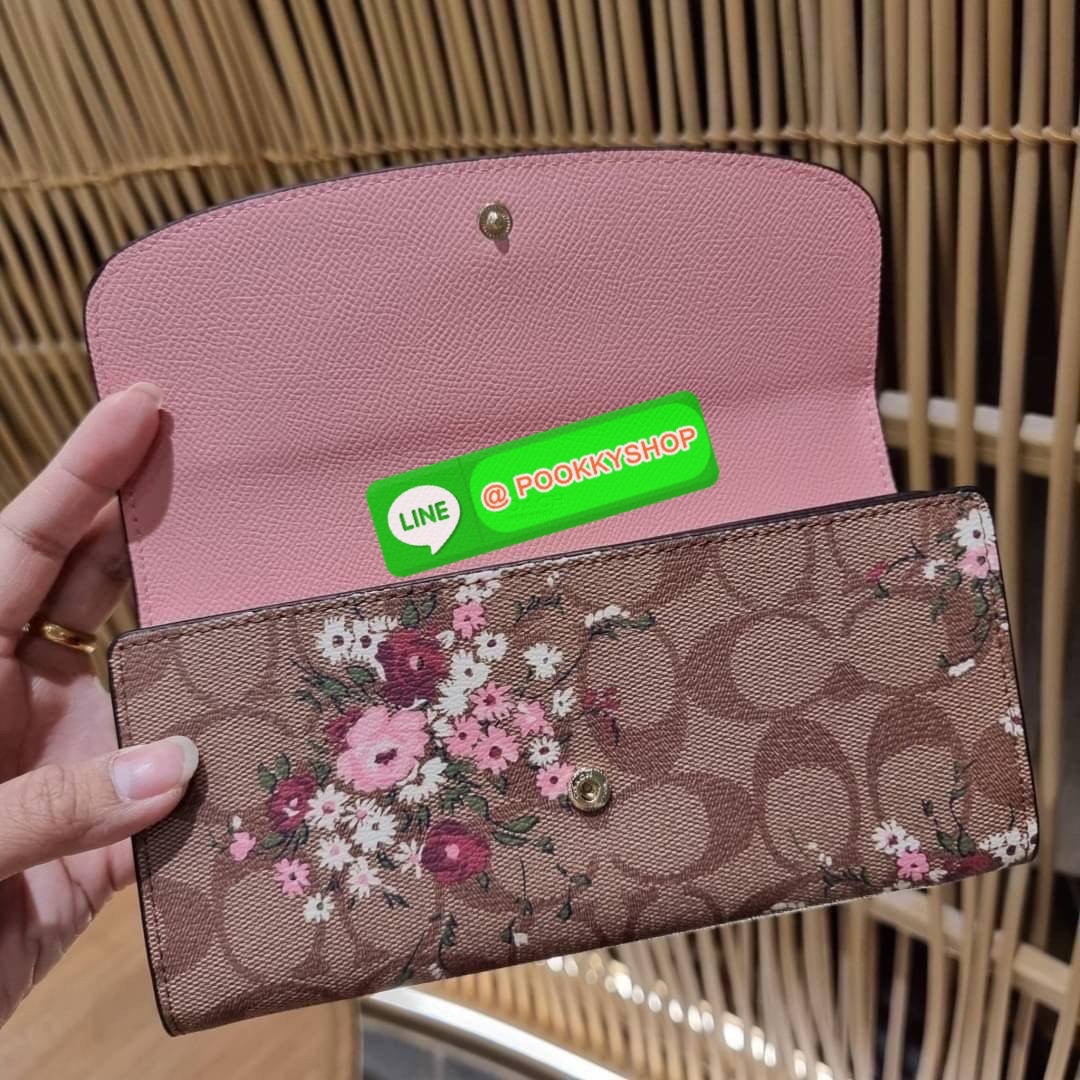 COACH F29395 SLIM ENVELOPE WALLET IN SIGNATURE CANVAS WITH FLORAL BUNDLE PRINT กระเป๋าสตางค์รุ่นขายดี ทรงจดหมายรุ่นฝาพับ ดีไซน์ลายช่อดอกไม้ น่ารักสดใส วัสดุหนังแคนวาสเคลือบลาย ภายในใส่มือถือได้ ใส่บัตรได้ มีช่องซิปแยกแบ่งเป็นสัดส่วน ใบจริงคือดีงาม สาวๆใช้