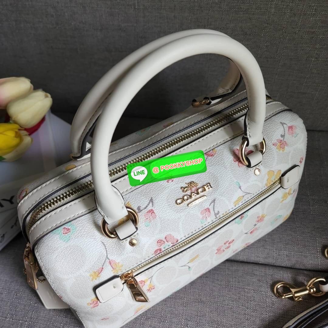 COACH ROWAN SATCHEL IN SIGNATURE CANVAS WITH MYSTICAL FLORAL PRINT (COACH C8615) กระเป๋าสะพายข้างทรงหมอนเป็นอีกรุ่นมาแรงสุดๆ ฮอตตลอด เป็นทรงที่ต้องมาติดตู้ โดดเด่นอย่างลงตัวกับรุ่นนี้ หมอน 10" รุ่นมีช่องซิปด้านหน้า สามารถแยกเก็บของสำคัญๆได้อย่างเป็นส