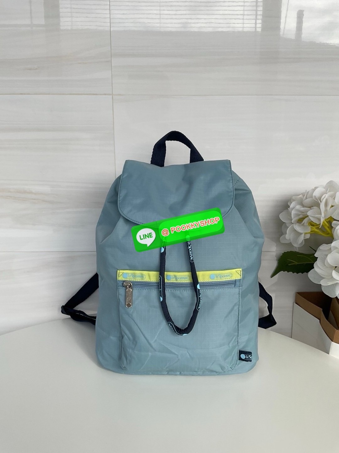 🚚 พร้อมส่ง 🚚 Japan LeSportsac Casual Versatile Portable Women's Bag Solid Color Blue Bucket Bag Flip Backpack สินค้าแบรนด์แท้100% พร้อมแท็ก! กระเป๋าเป้สะพายหลังลําลอง ทรงบักเก็ต น้ําหนักเบา กระเป๋าเป้หูรูด กระเป๋าเดินทางขนาดกลาง ด้านห