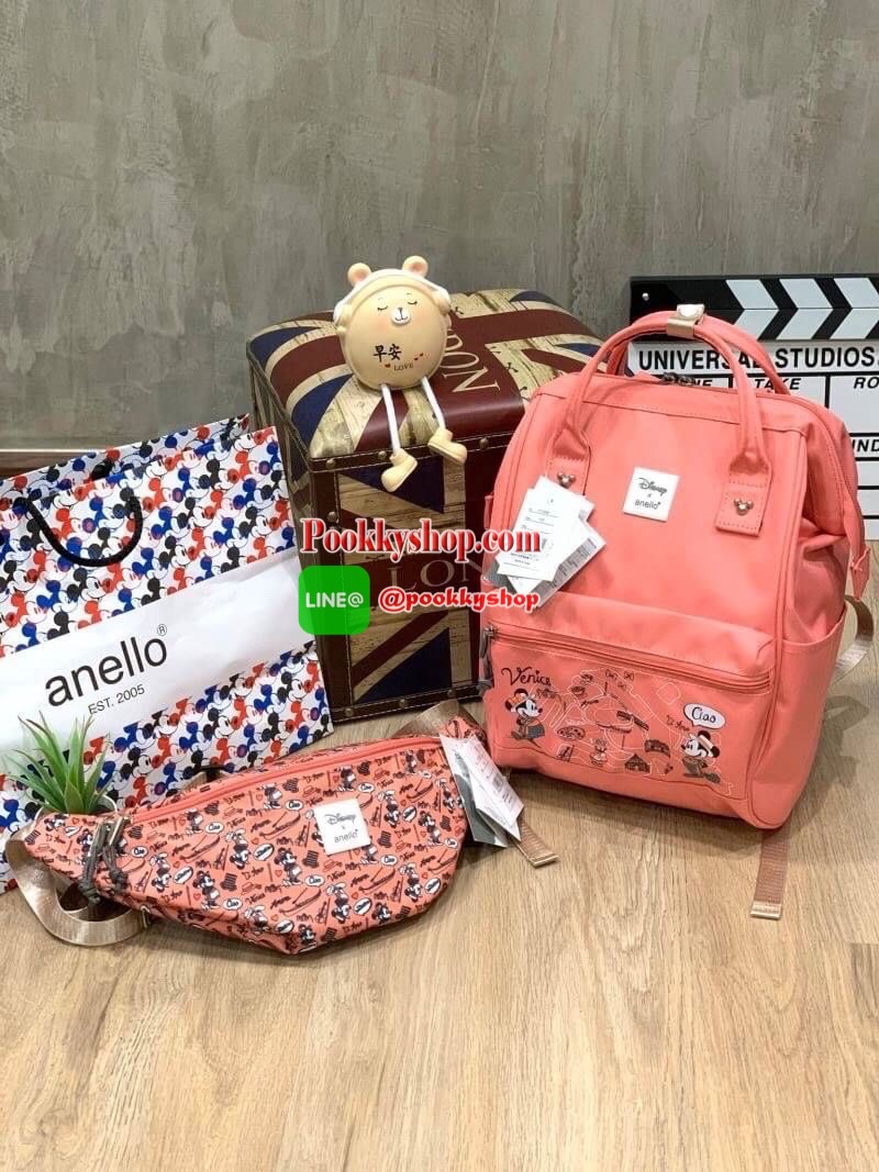 ANELLO กระเป๋าคาดอก CROSSBODY MINI DISNEY X ANELLO รุ่นDT-G010 กระเป๋าทรงคาดอก คาดเอว หรือสะพายครอสบอดี้ จากDisney x anello ซีรีย์ Let's travel with Mickey คอลเลคชั่นใหม่ที่มีการนำทั้ง 5 ประเทศ เอาสถานที่มาวางบนตัวกระเป๋าและมีตัวการ์ตูนสุดคลาสสิคอย่า