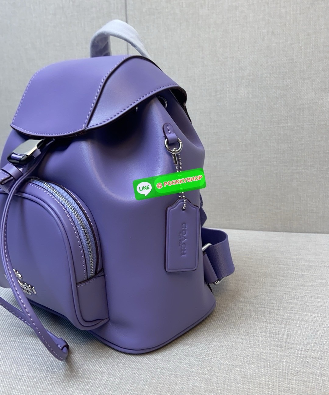 COACH PACE BACKPACK COACH CR100 | Refined calf leather | Inside zip and multifunction pockets | Drawstring and speedclip closures, fabric lining | Handle with 3" drop | Outside zip pocket | Outside zip access to interior |