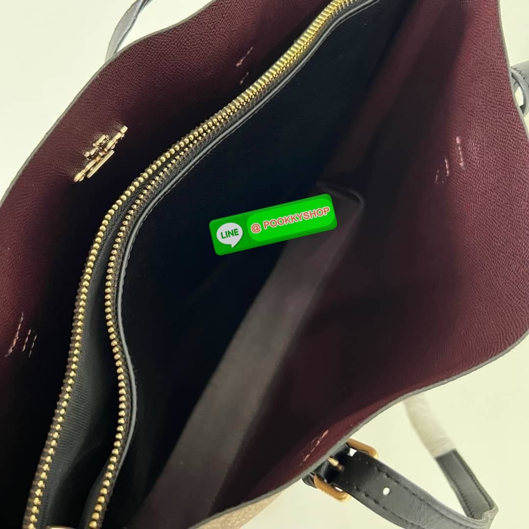 Coach MOLLIE TOTE IN SIGNATURE CANVAS (COACH 1665) กระเป๋าหนังใบเคลือบซิกเนเจอร์และหนังเรียบ ภายในกระเป๋ามัลติฟังก์ชั่น ปิดด้วยซิป ซับในผ้า หูหิ้วพร้อมหูหิ้ว 10 1/4" ช่องเปิดด้านข้าง