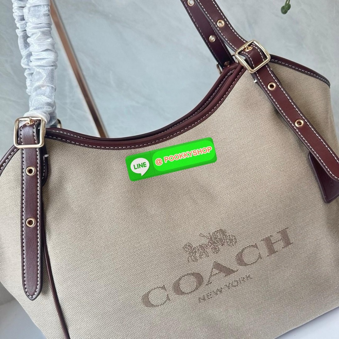COACH CR167 MEADOW SHOULDER BAG 🔖กระเป๋าถือคอลเลคชั่นใหม่ ใบใหญ่ตอบโจทย์คนสัมภาระเยอะ 🔖วัสดุ: ผ้าแคนวาสตัดขอบหนังแท้ 🔖เปิด-ปิดด้วยซิป 🔖ภายในโล่งใส่ของได้เยอะมาก มีช่องซิป1ช่อง ช่องใส่ของจุกจิก1ช่อง 🔖ด้านหลังมีช่องซิ