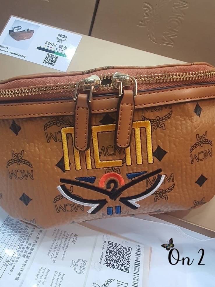 Mcm bag กระเป๋าคาดอกคาดเอวงานแบรนด์ ลาย โมโนแกรม หนังสวยงานดีงานเป๊ะมากค่ะ ผู้หญิงสะพายได้ ผู้ชายสะพายดี ห้ามพลาดน้า