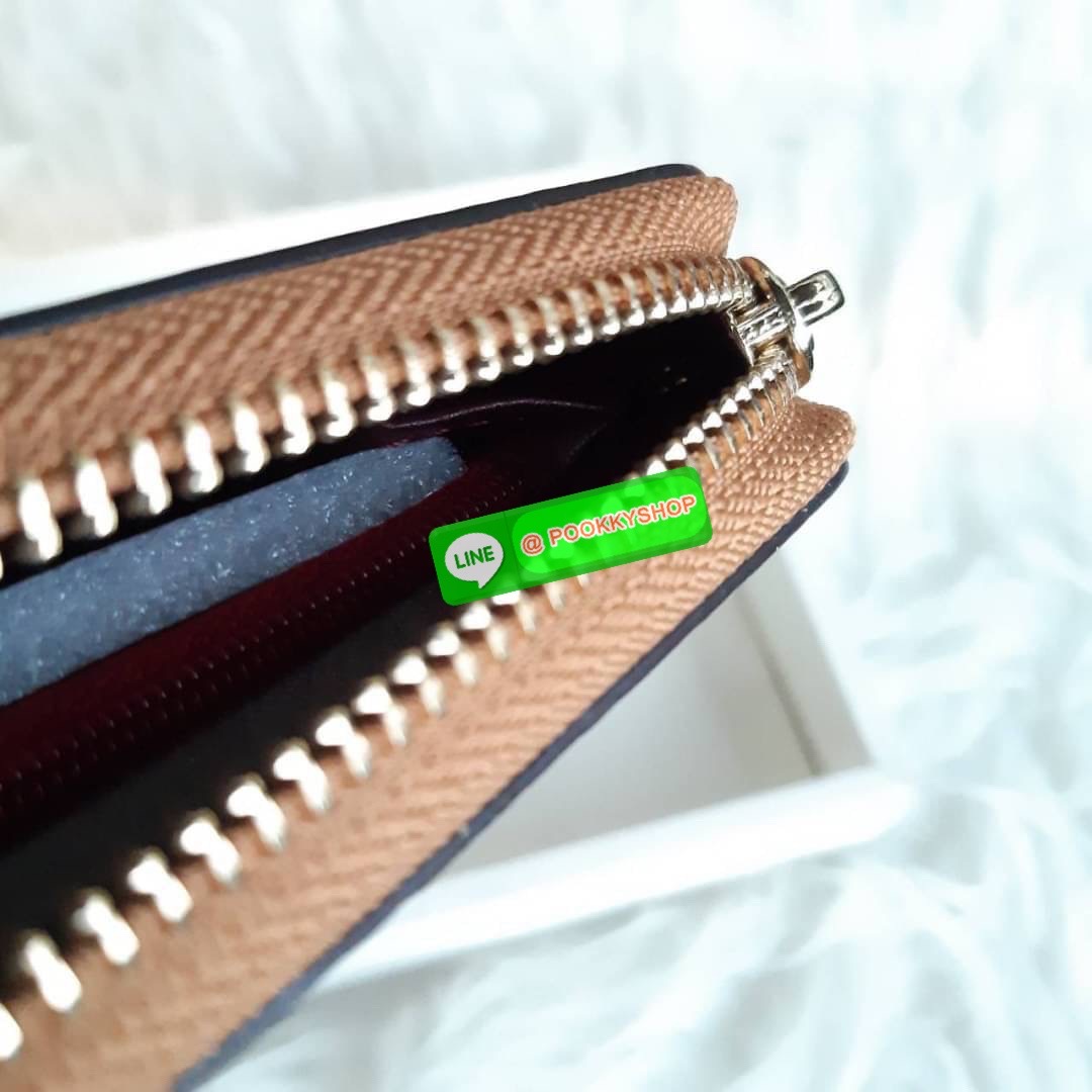 COACH F78018 ACCORDION ZIP WALLET IN SIGNATURE CANVAS WITH PRAIRIE DAISY CLUSTER PRINT ฮอตไม่เลิก!! กระเป๋าสตางค์ใบยาว ลวดลายดอกไม้ ขายดีที่สุด!! วัสดุหนังแคนวาสเคลือบลาย เปิด-ปิดด้วยซิปรอบ รูดใช้งานง่าย ใส่มือถือได้ ใส่บัตร ใส่ธนบัตรได้สบายๆ สวยเกินราคาแ